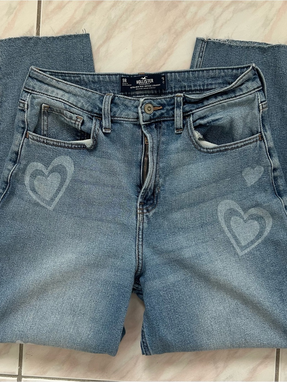 Hollister Women's Light Blue Straight Leg Jeans with Heart Graphics
